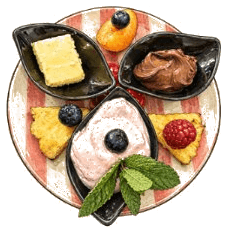 Kinderteller mit Croissant, Nutella, Fruchtzwerg und frischem Obst